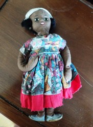 8'' VINTAGE BROWN CLOTH ISLAND DOLL, PRINT DRESS, JEWELLRY
